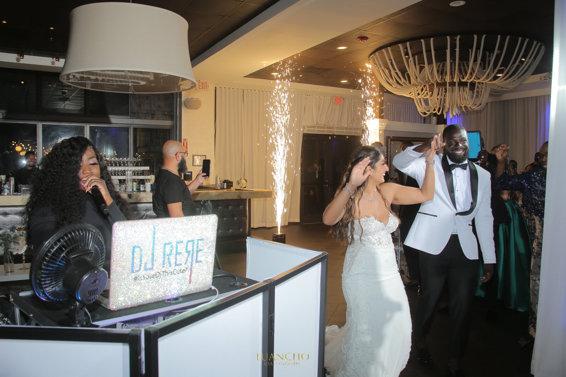 DJ ReRe at a wedding grand entrance with sparklers